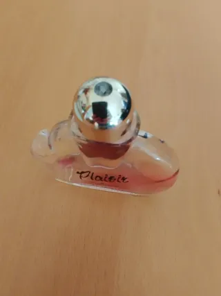 Frasco de colonia vintage Plaisir, está vacío.