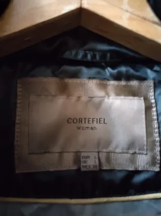 Chaqueta negra con cinturón