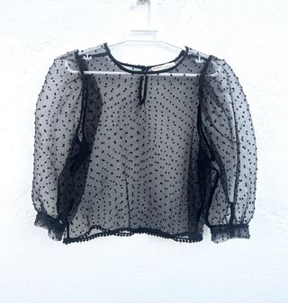 Blusa plumeti negra