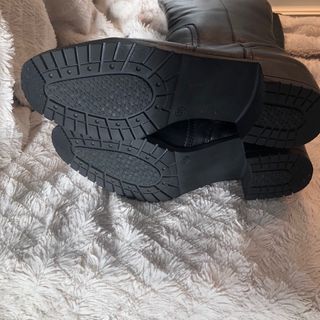 Botas altas negras con hebilla