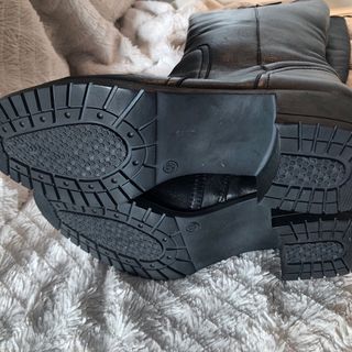 Botas altas negras con hebilla