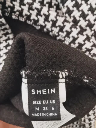 Casaco elegante preto e branco