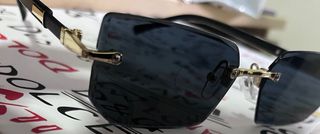 Occhiali da sole neri specchiati