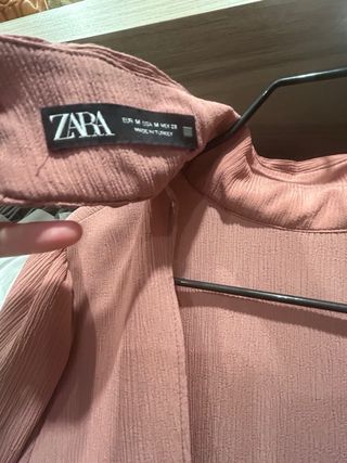 Blusa rosa empolvado elegante