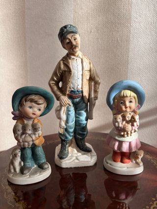 Figuras porcelana: Cazador y niños con cachorros
