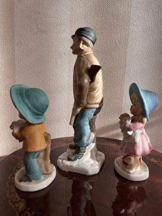Figuras porcelana: Cazador y niños con cachorros