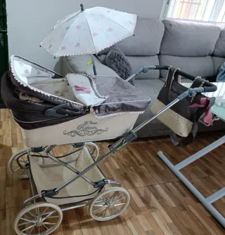 Carro de muñecas con capota y bolso
