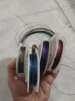 Bobinas hilo acero bisutería colores