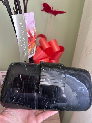 Bolso de fiesta negro efecto mármol