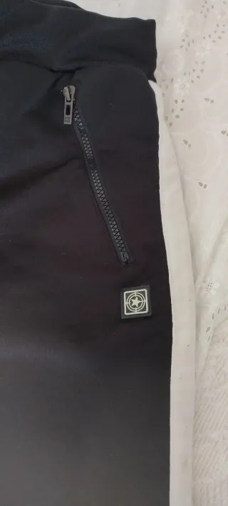 Pantaloni tuta neri con zip