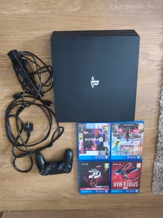 PS4 Pro 1TB + Mando, Cámara y 4 Juegos
