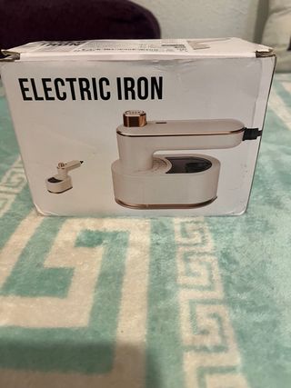 Plancha de viaje a vapor