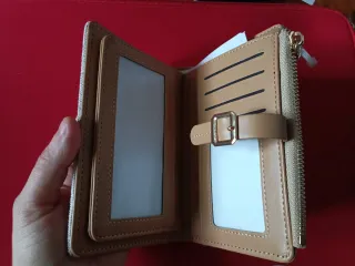 Cartera de tela nueva.