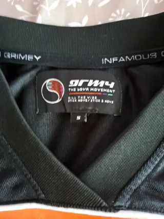 Camiseta Grimey Negra y Naranja