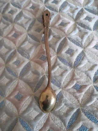 Cuchara antigua decorada