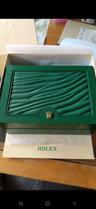 Reloj Rolex Verde y Plateado