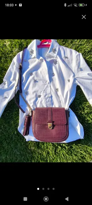 Blusa blanca con abalorios