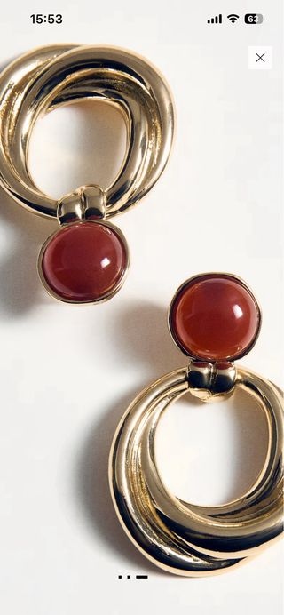 Pendientes aro dorados con piedra granate