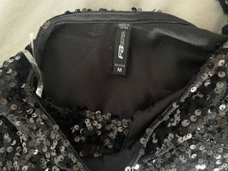 Mono negro lentejuelas fiesta fin de año