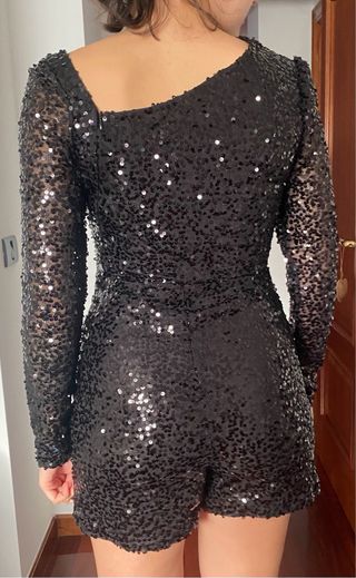 Mono negro lentejuelas fiesta fin de año