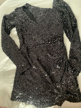 Mono negro lentejuelas fiesta fin de año