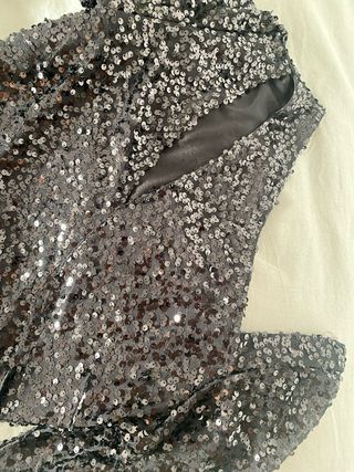 Mono negro lentejuelas fiesta fin de año