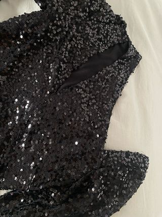 Mono negro lentejuelas fiesta fin de año