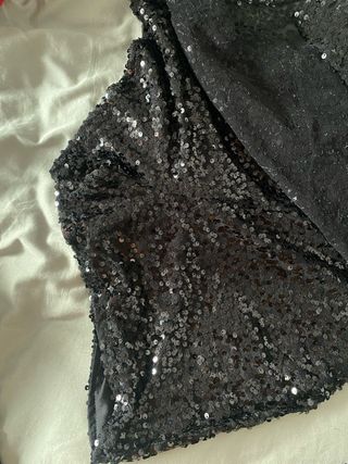 Mono negro lentejuelas fiesta fin de año