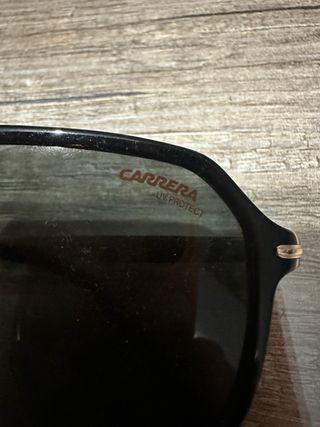 Gafas de sol Carrera negras y doradas