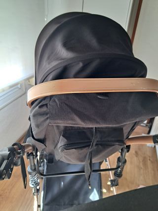 Carro bebé 3 en 1 negro y dorado