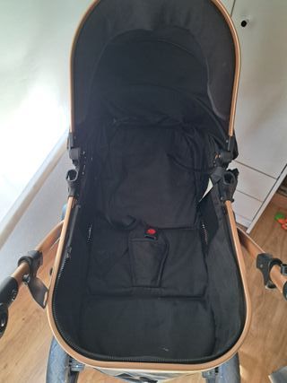 Carro bebé 3 en 1 negro y dorado