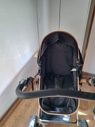 Carro bebé 3 en 1 negro y dorado