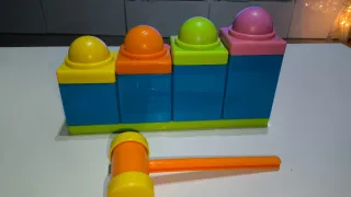 Juego de movilidad infantil con martillo