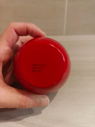 Candela profumata a forma di mela rossa