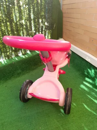 Carrito de muñecas rosa