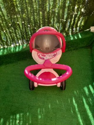 Carrito de muñecas rosa