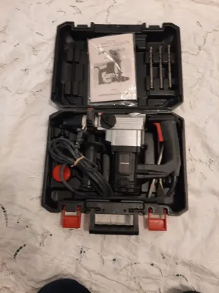 Taladro percutor con maletín