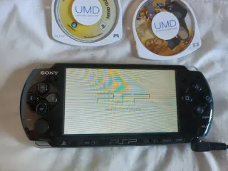 Sony PSP 3004 Nero + 7 UMD + Caricatore