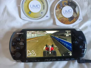 Sony PSP 3004 Nero + 7 UMD + Caricatore