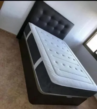 Canapé de tela y polipiel negro/blanco