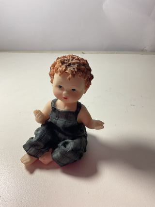 Statuetta bambino collezionabile