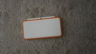 Nintendo 2DS XL Naranja y Blanco