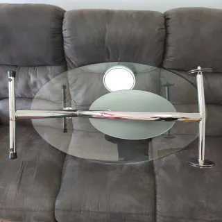 Mesa de centro cristal ovalada con ruedas