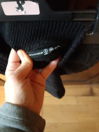 Falda de punto negra con trenzas