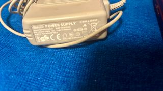 Nintendo DSi XL + Cargador y R4 con 46 juegos