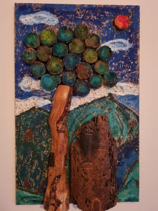 Quadri fatti a mano con pietre e legno