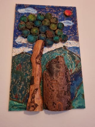 Quadri fatti a mano con pietre e legno