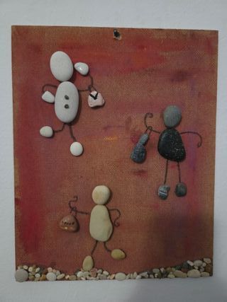 Quadri fatti a mano con pietre e legno