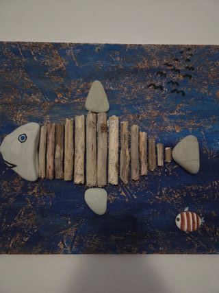 Quadri fatti a mano con pietre e legno