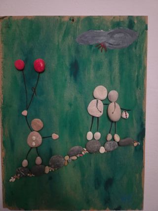 Quadri fatti a mano con pietre e legno